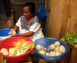 Masa seller - Merida, Yucatan, Mexico Woman masa seller at the municipal market in Merida, Yucatan, Mexico