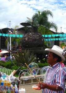 Bubble Man in front of recyled quince sculpture, Expo Membrillo 2010 - Atotonilquillo, Jalisco, Mexico Bubble Man in front of recyled quince sculpture, Expo Membrillo 2010, in Atotonilquillo, Jalisco, Mexico